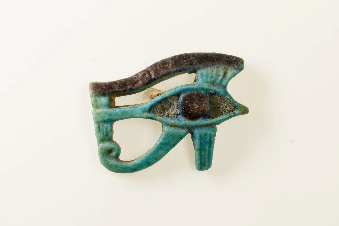 Wedjat Amulet; blue faience.