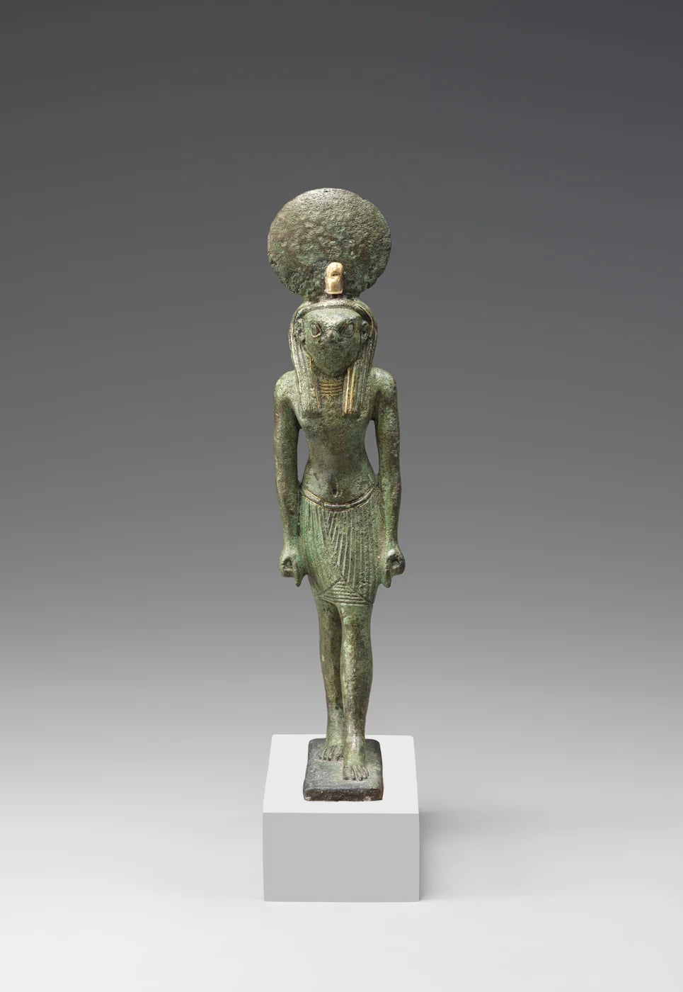 Standing Figure of Re-Harakhty; cupreous metal.