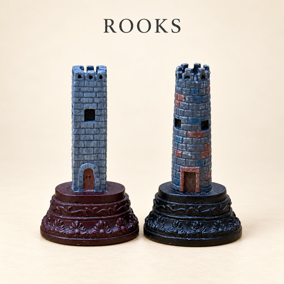 Two cylindrical tower-shaped Chinese Dynasties pewter rook pieces with brickwork details.