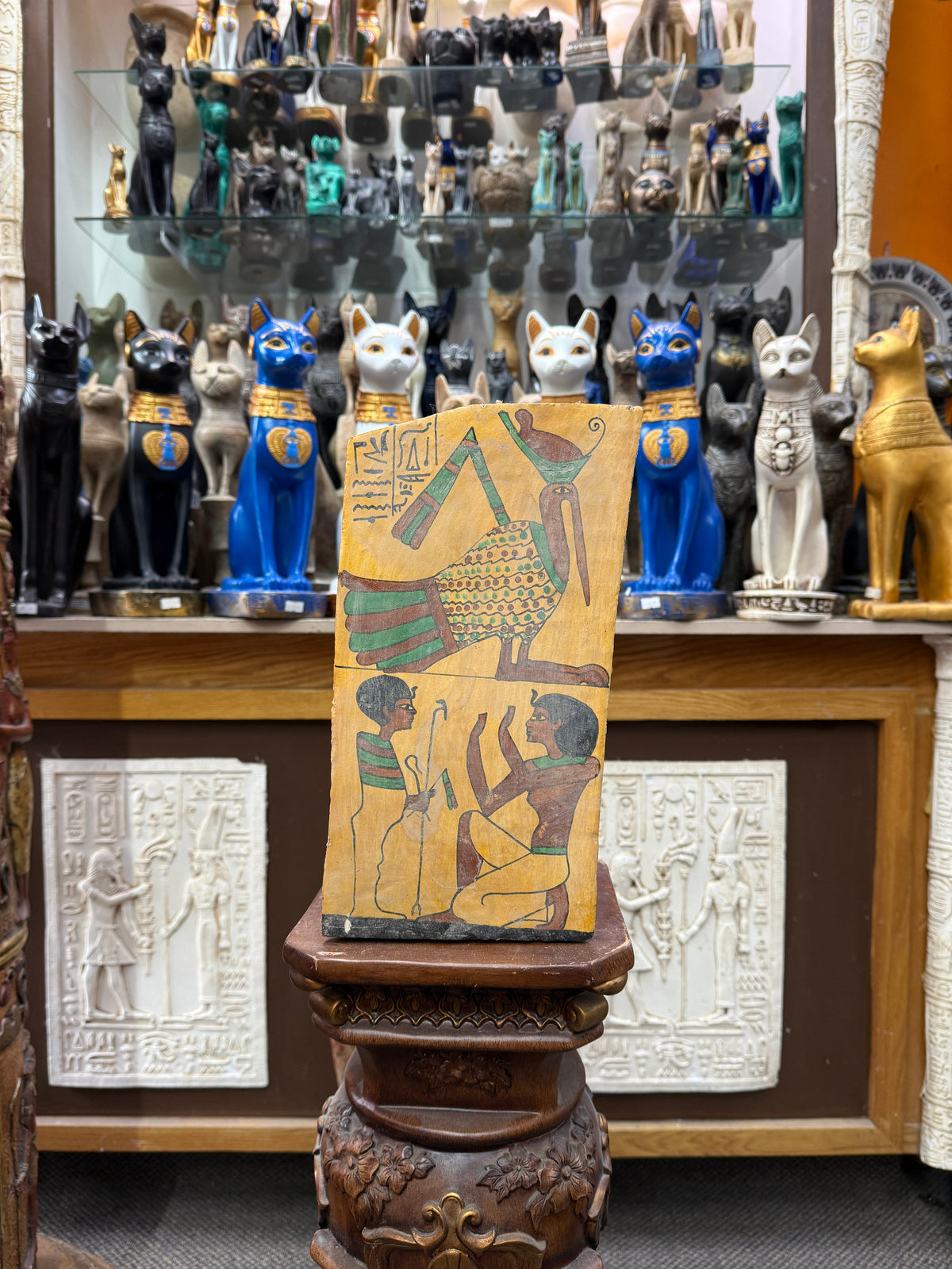 Full front view of the 11.5 by 6 inch Offering to Thoth wood plaque, displayed upright in the shop.