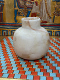 Rounded cream alabaster vase with a short straight neck, delicate warm veins and honey-coloured patches — unlit full view.