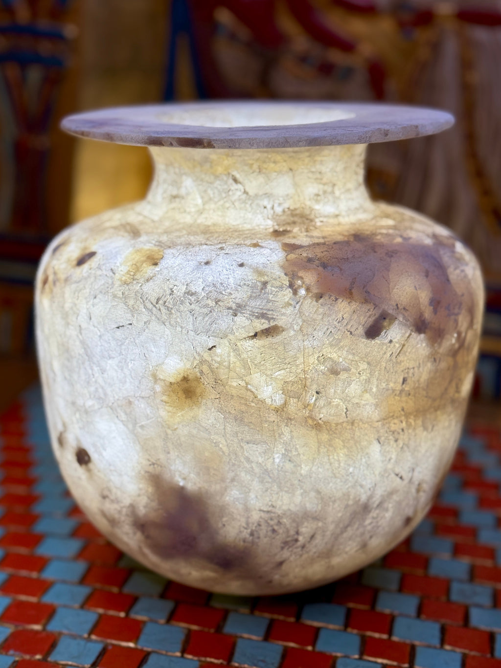 Rounded alabaster vase with cloudy cream stone, honey and brown patches, a low neck and broad flared rim — additional view 2.