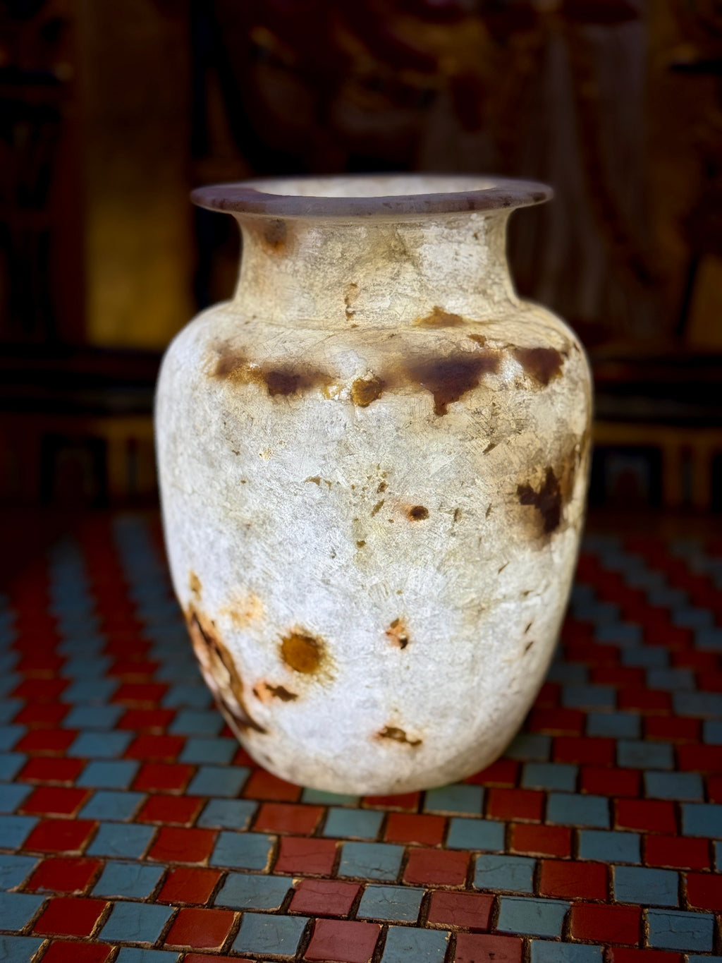 Small cream alabaster vase with warm brown markings, rounded shoulders and a flared rim — additional view 1.