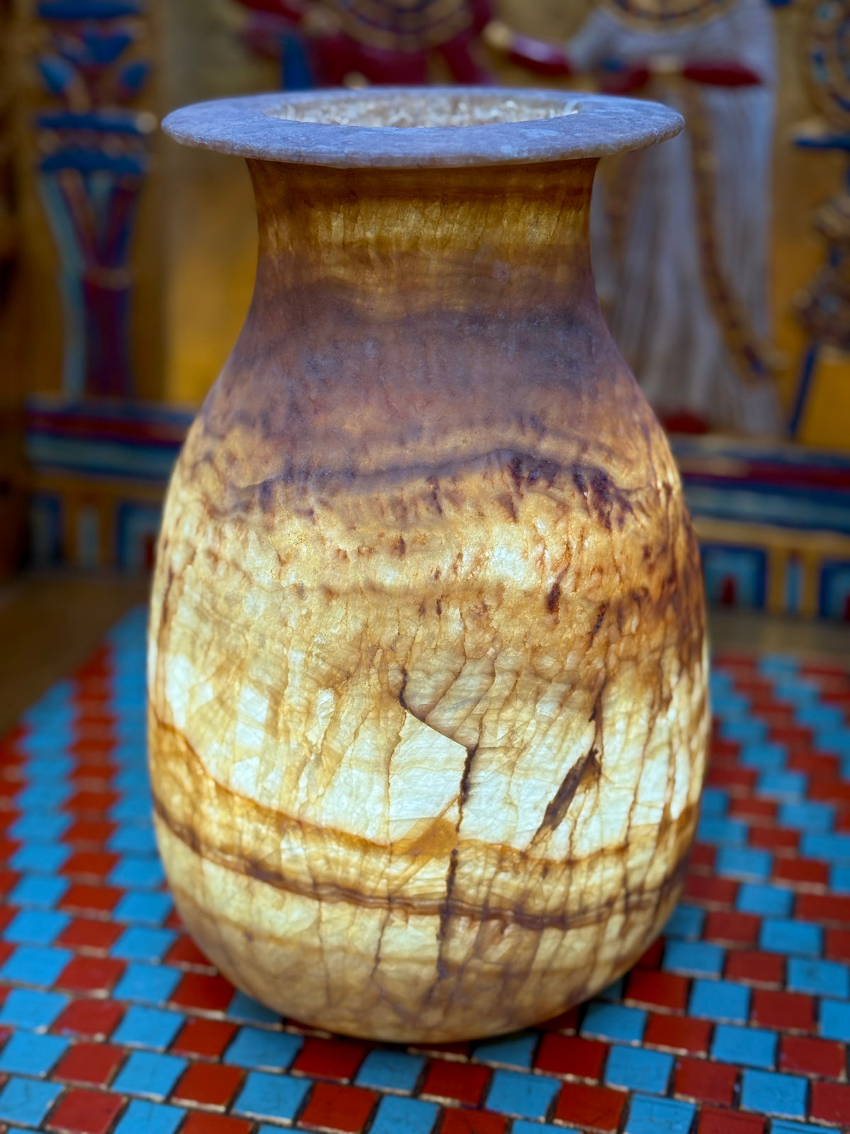 Tall alabaster vase with amber-brown horizontal bands, fine vertical veins and a flared rim — additional view 2.