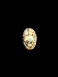 Top view of Egyptian scarab SC-057, showing cream tones with strongly outlined beetle details.