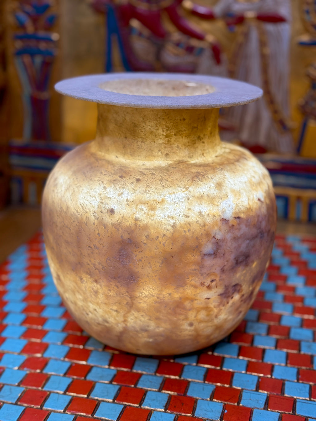 Rounded alabaster vase with smoky brown and honey-coloured layers, a short neck and flared rim — additional view 2.