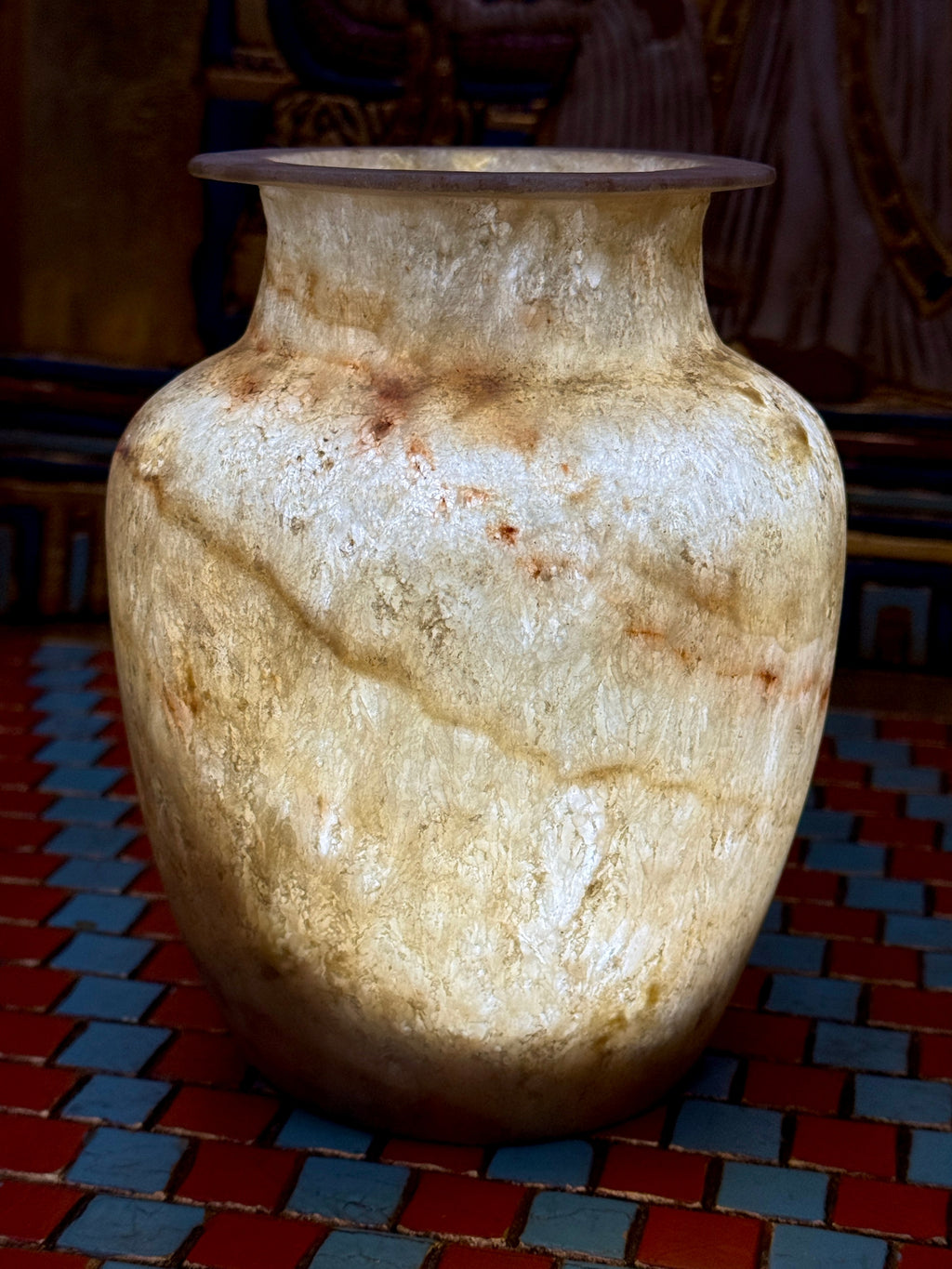 Slender cream alabaster vase with warm flowing veins, rounded shoulders and a flared rim — additional view 2.