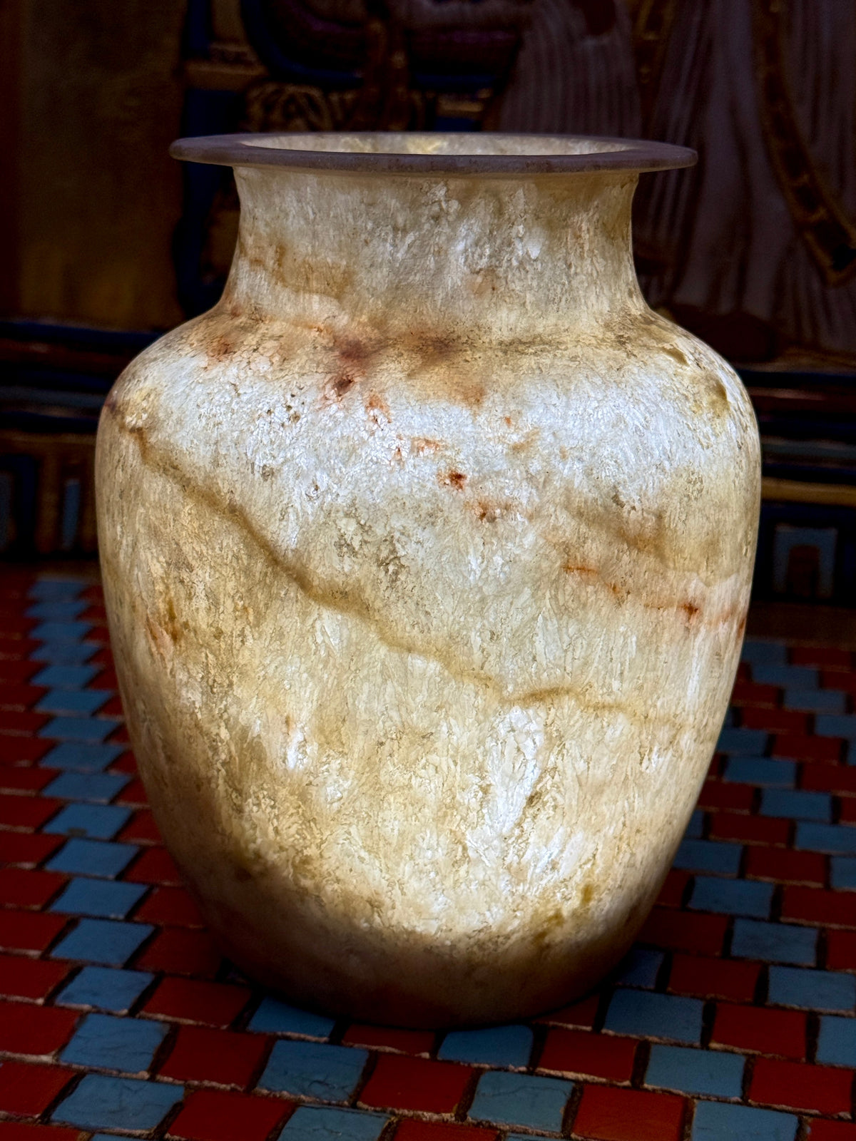 Slender cream alabaster vase with warm flowing veins, rounded shoulders and a flared rim — additional view 2.
