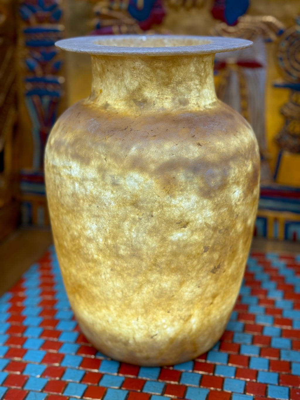 Tall alabaster vase with honey and smoky brown layers, rounded shoulders and a broad flared rim — additional view 1.