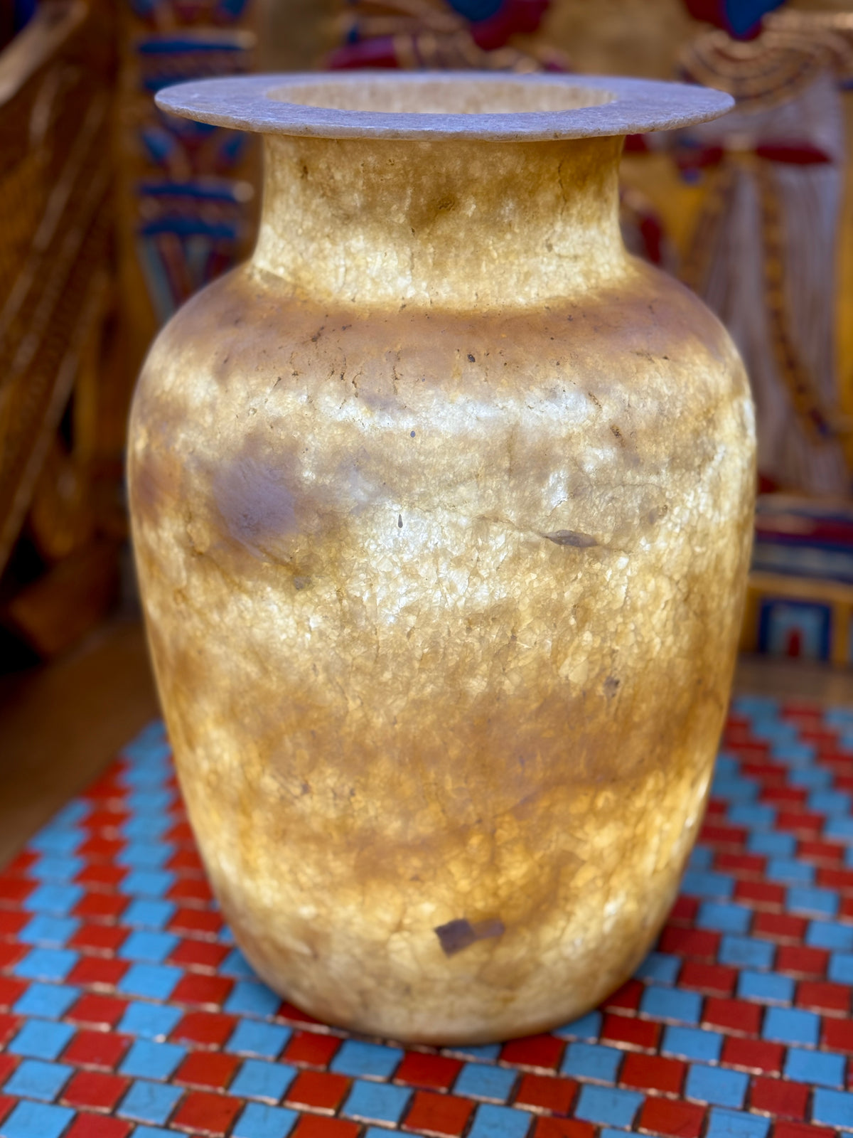 Tall alabaster vase with honey and smoky brown layers, rounded shoulders and a broad flared rim — additional view 2.