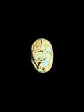 Top view of Egyptian scarab SC-060, showing cream and pale green tones.