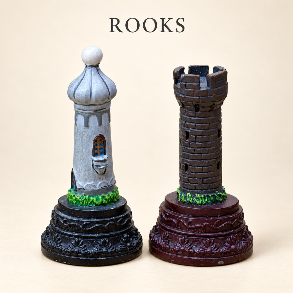 Crusaders vs. Arabs pewter rook pieces showing a light-coloured domed tower and a dark battlement tower.