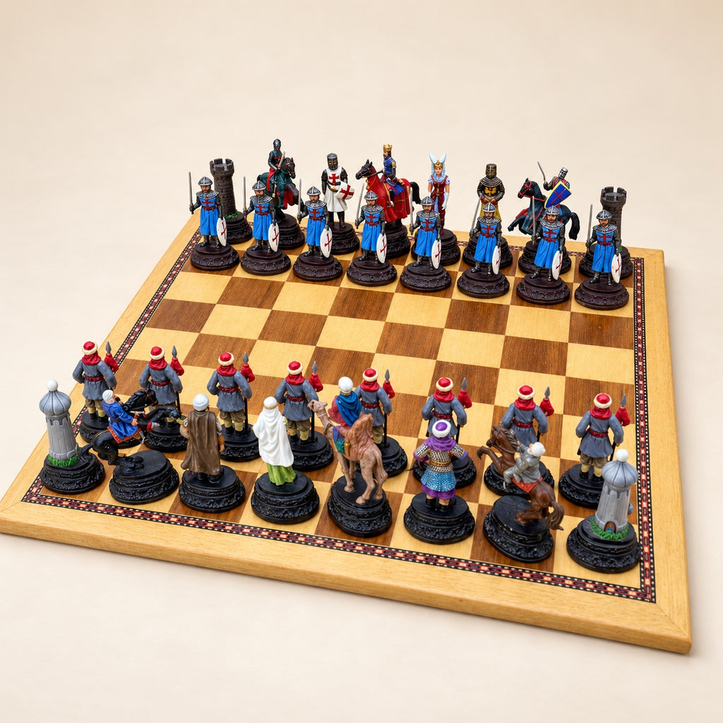 Crusaders vs. Arabs pewter chess pieces arranged on a display chessboard, with dark red and black bases. Board not included.