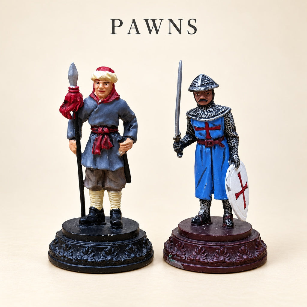 Crusaders vs. Arabs pewter pawn pieces, one wearing a red head covering and one in armour with a white shield.