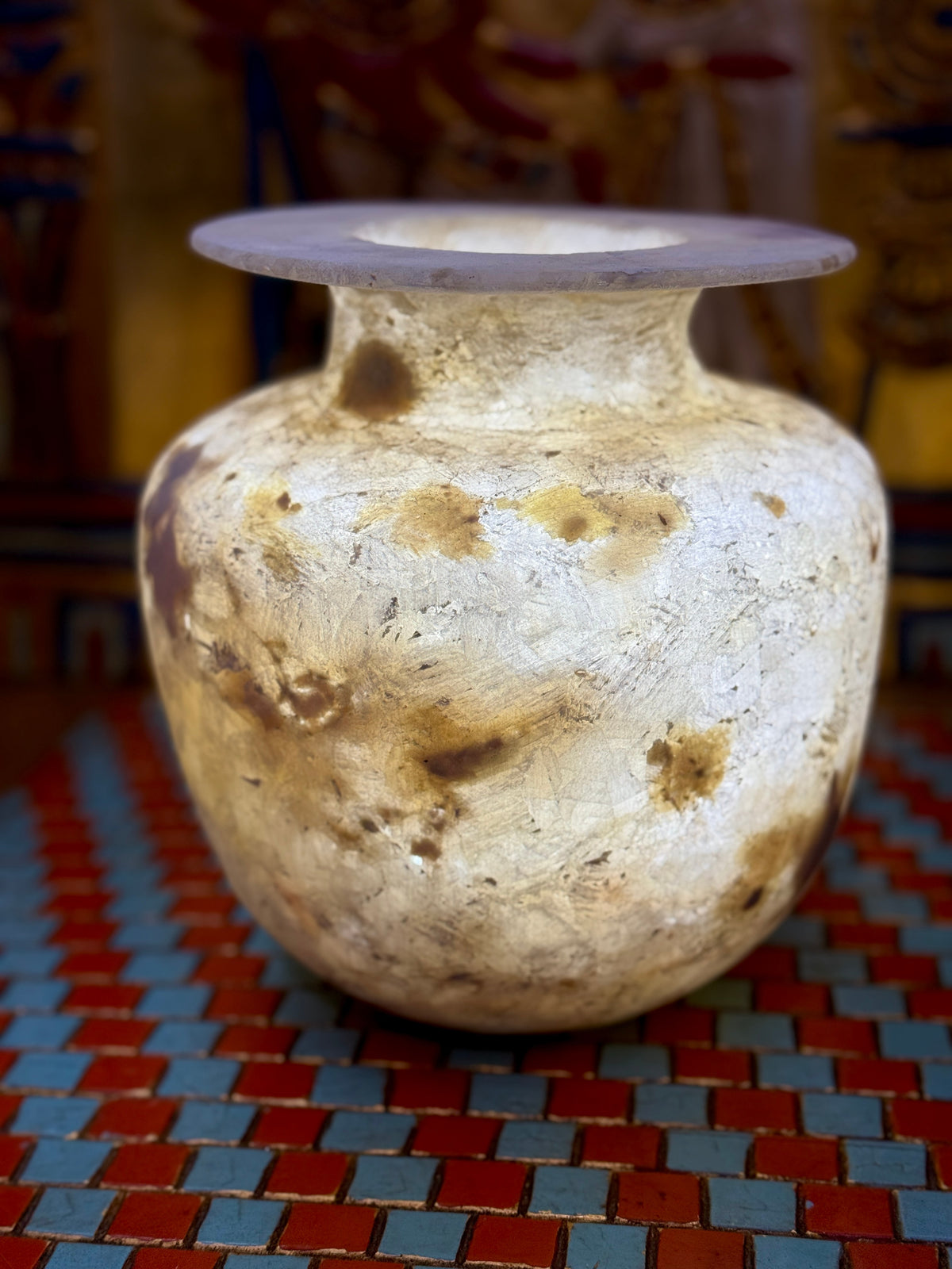 Rounded alabaster vase with cloudy cream stone, honey and brown patches, a low neck and broad flared rim — additional view 1.