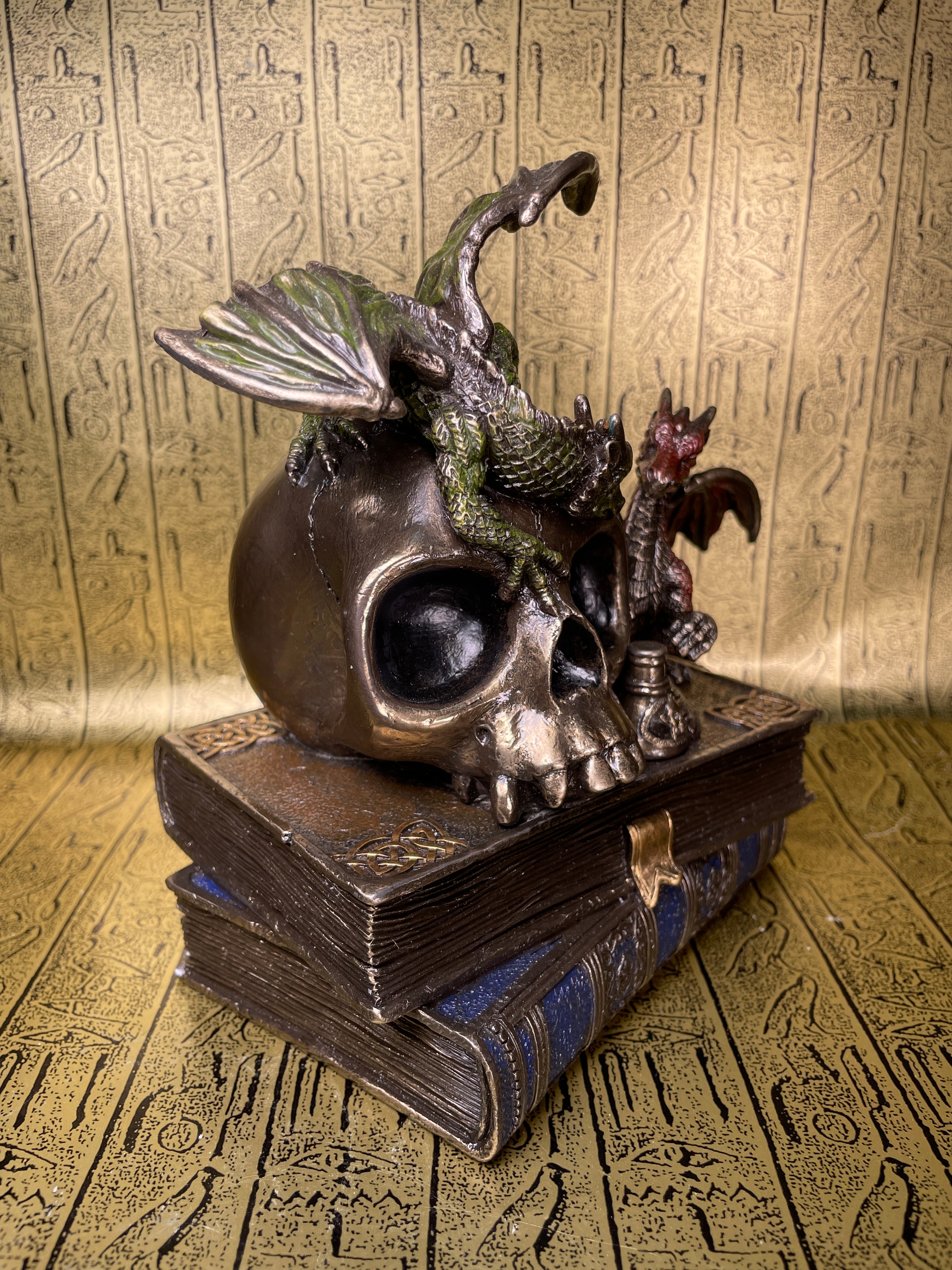 Dragonlings on Skull and Books