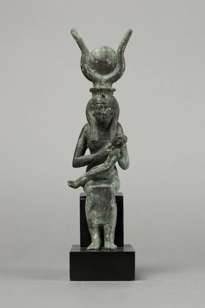 Isis and Horus; cupreous metal, precious metal inlay.