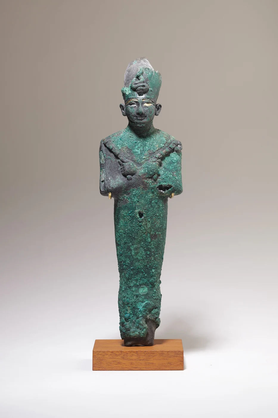 Osiris; copper alloy, stone.