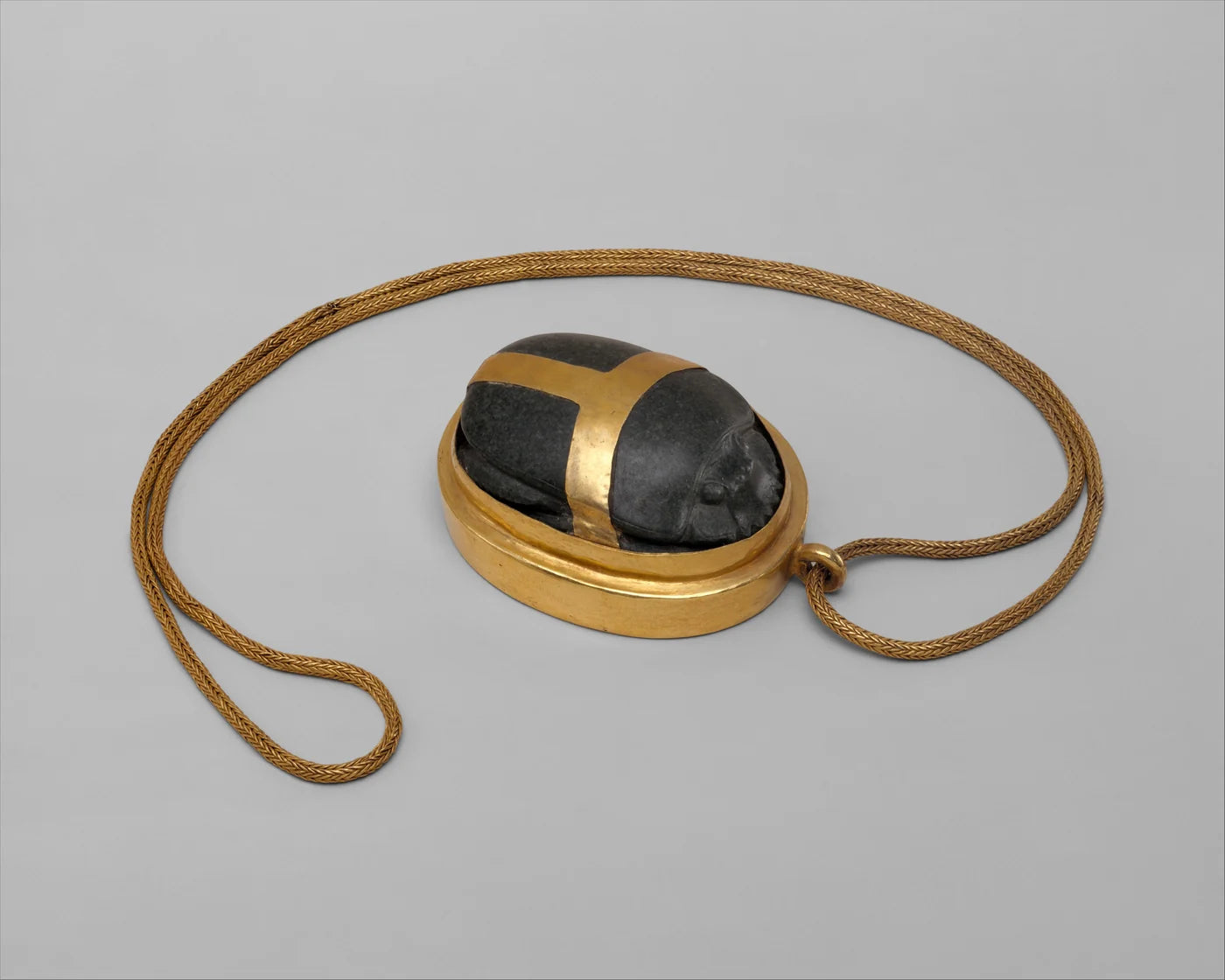 Heart Scarab of Hatnefer; serpentinite, gold.